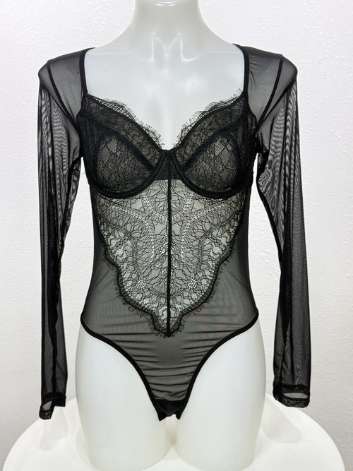 Front view of the Primrose black lace bodysuit on a mannequin.
