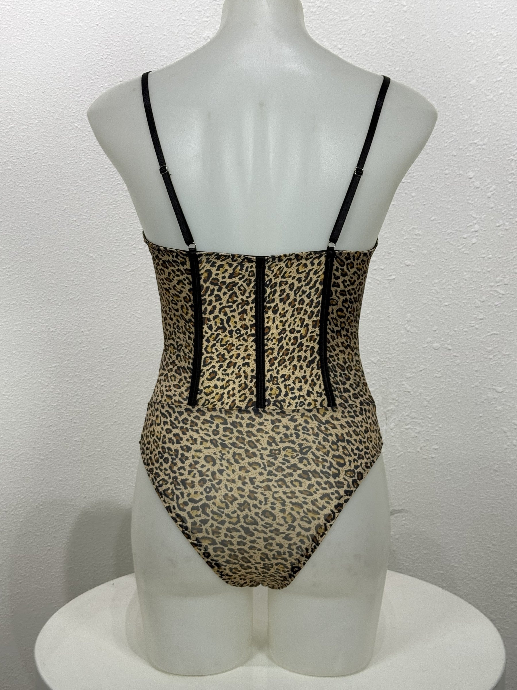 Back view of the Tansy leopard bodysuit on a mannequin.